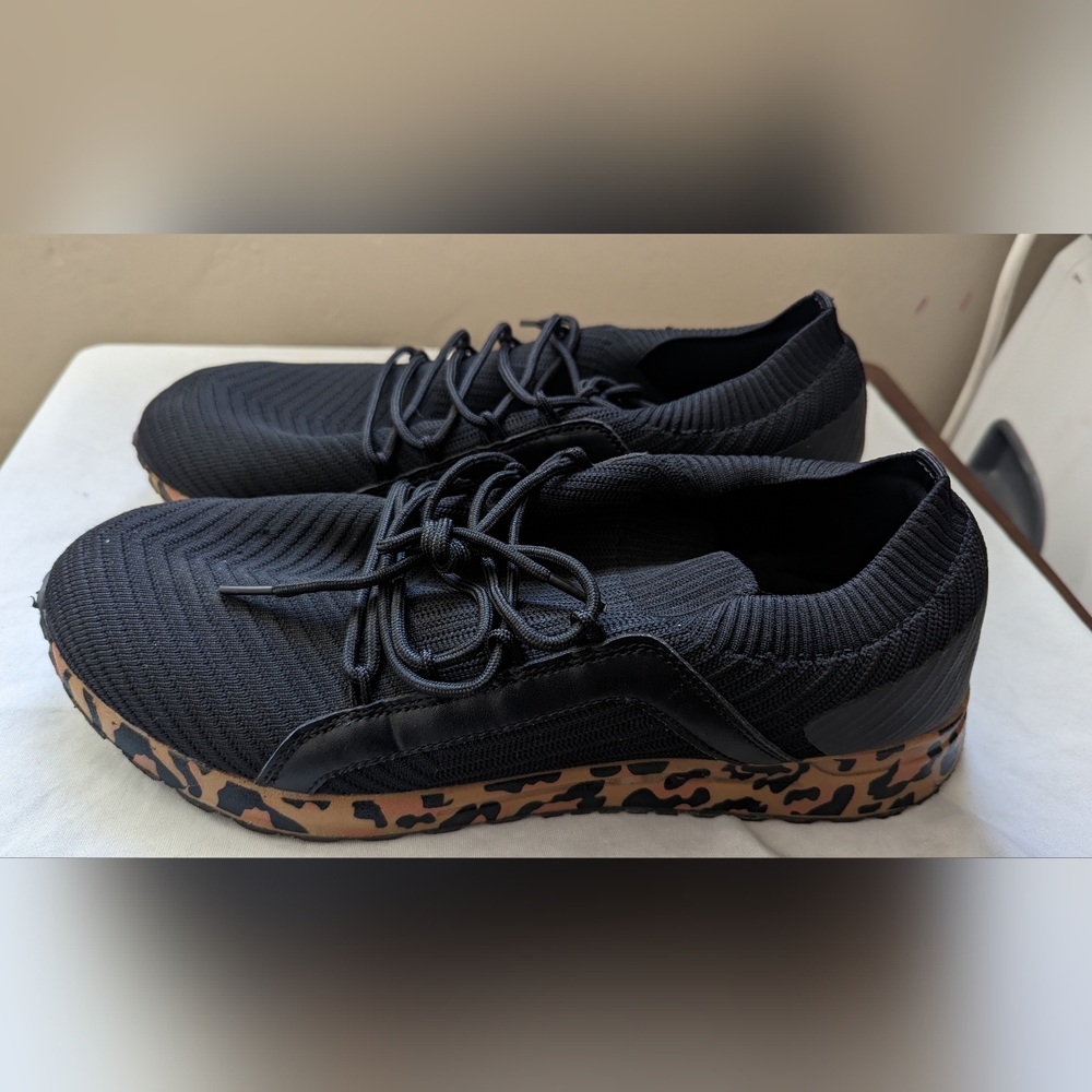 Torrid-Black active sneakers with cheetah print